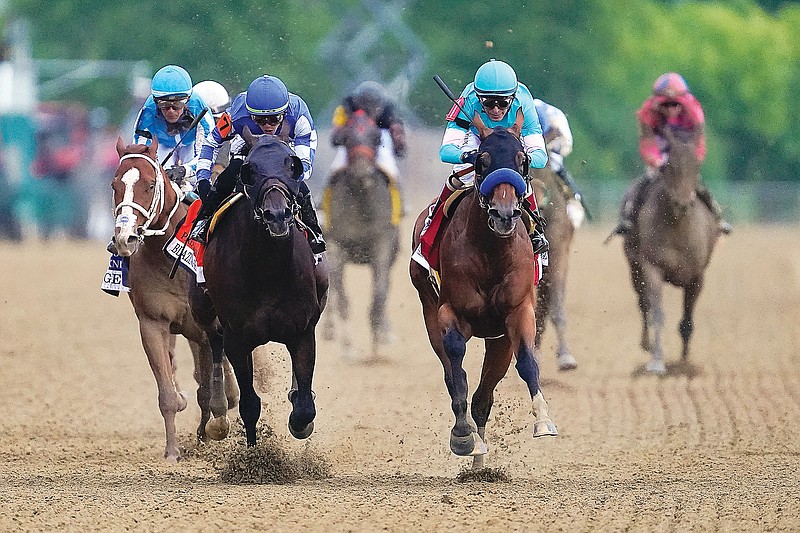 Returning from ban, Baffert wins Preakness with National Treasure