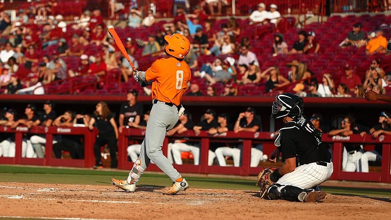 Tennessee Athletics photo / Tennessee’s Christian Scott watches the flight of his three-run home run during Saturday’s 12-1 dismantling of South Carolina in Columbia. The Volunteers resume play Tuesday afternoon against Texas A&M at the Southeastern Conference tournament in Hoover, Alabama.