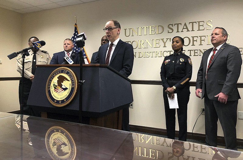 Kevin Ritz, the U.S. attorney in West Tennessee, speaks during a news conference, Monday, May 22, 2023, in Memphis, Tenn., about a crackdown on devices that turn semiautomatic firearms into machine guns. (AP Photo/Adrian Sainz)
