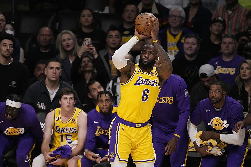 Los Angeles Lakers forward LeBron James shoots against the Denver Nuggets in the first half of Game 4 of the NBA basketball Western Conference Final series Monday, May 22, 2023, in Los Angeles. (AP Photo/Mark J. Terrill)