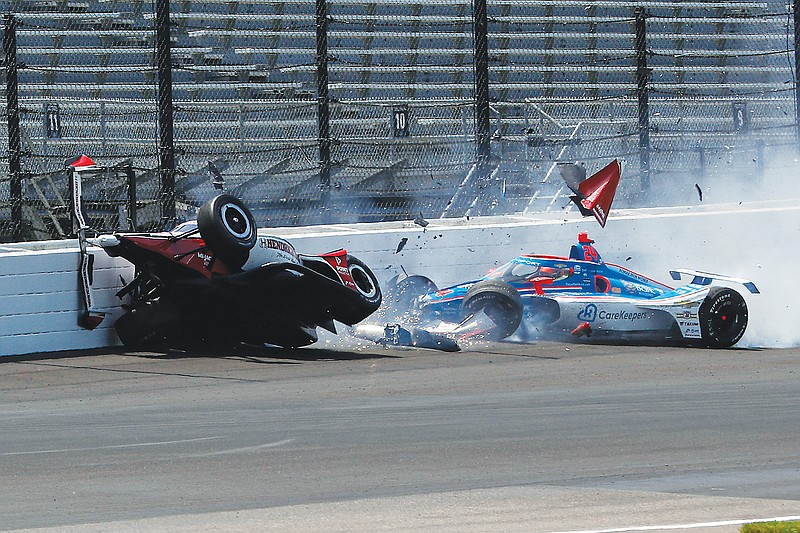 Wilson fractures vertebrae in crash in Indy practice session