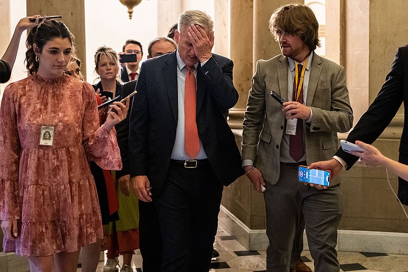 House Speaker Kevin McCarthy walks to his office Wednesday after a vote on the House floor. “We’re not going to default,” McCarthy said, adding that negotiators “made some progress” at the White House.
(The New York Times/Haiyun Jiang)