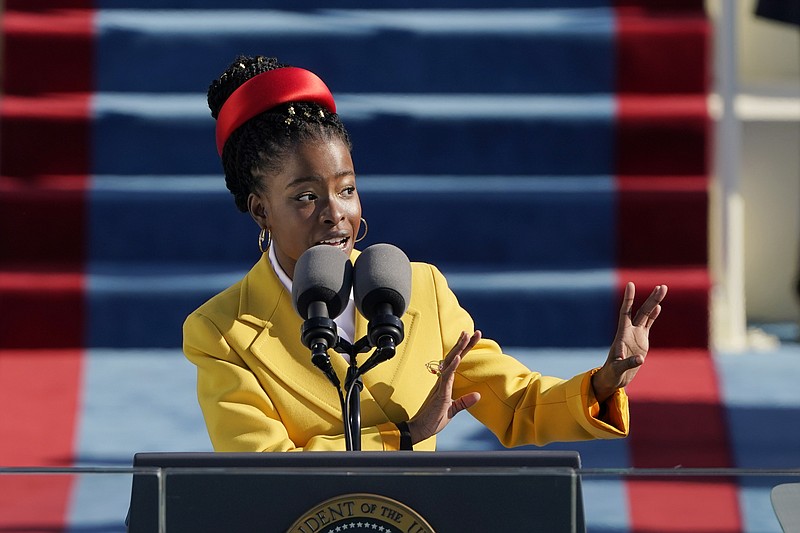 FILE - American poet Amanda Gorman recites a poem during the Inauguration of U.S. President Joe Biden at the U.S. Capitol on Jan. 20, 2021, in Washington. The poem written for Biden’s inauguration has been placed on a restricted list for elementary-aged students at a school in South Florida after a complaint by one parent. In a Facebook post on Tuesday, May 23, 2023, Gorman vowed to fight back. (AP Photo/Patrick Semansky, File)