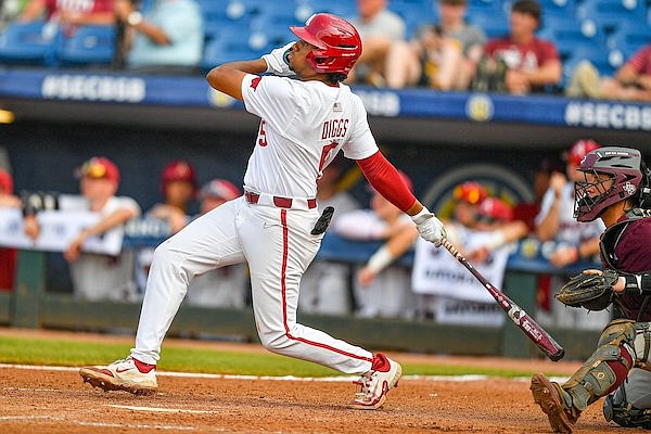 Arkansas designated hitter Kendall Diggs hits a game-winning home run against Texas A&M on Wednesday, May 24, 2023, at the SEC Tournament in Hoover, Ala.