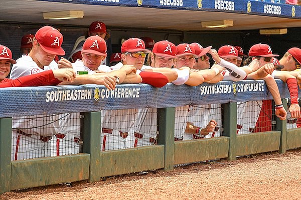 Arkansas players stand in the dugout prior to a game against Texas A&M on Wednesday, May 24, 2023, at the SEC Tournament in Hoover, Ala.
