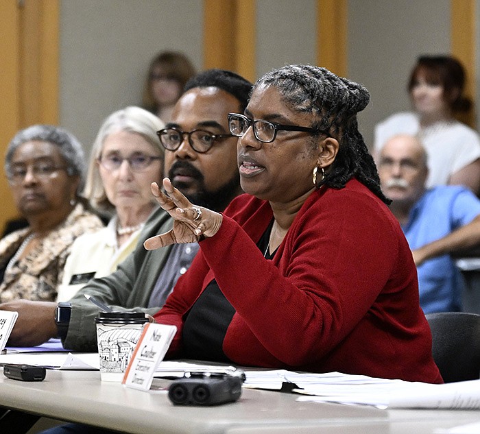 Stacey McAdoo, president of the Central Arkansas Library System’s board of directors, speaks ahead of the board’s vote Thursday at the CALS Main Library in Little Rock to challenge Act 372. The lawsuit will likely be joined by other co-plaintiffs, including two bookstores, individuals and CALS patrons.
(Arkansas Democrat-Gazette/Stephen Swofford)