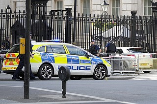 Man arrested after car collides with gates of Downing Street, where UK ...