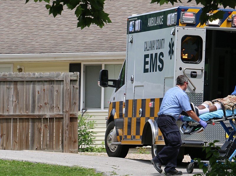 Callaway County EMS personnel transfer a patient in this May 2015 Fulton Sun file photo.