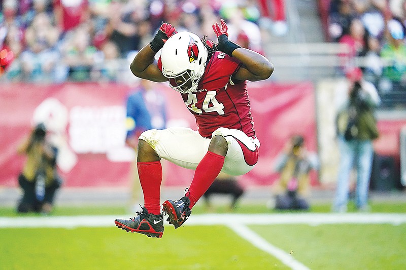 In this Nov. 6, 2022, file photo, Markus Golden celebrates a sack for the Cardinals during a game against the Seahawks in Glendale, Ariz. (Associated Press)
