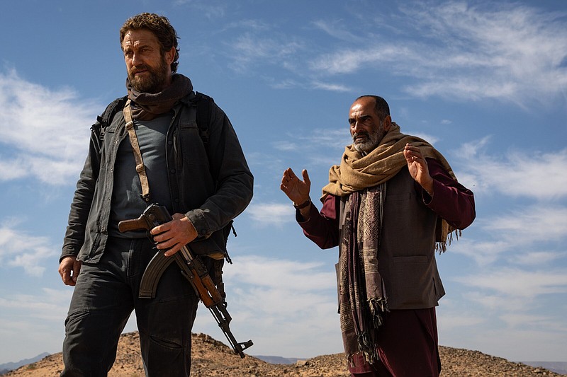 Mercenary Tom Harris (Gerard Butler) finds himself teamed up with an Afghan translator he calls “Mo” (Navid Negahban) in the better-than-average action thriller “Kandahar.”