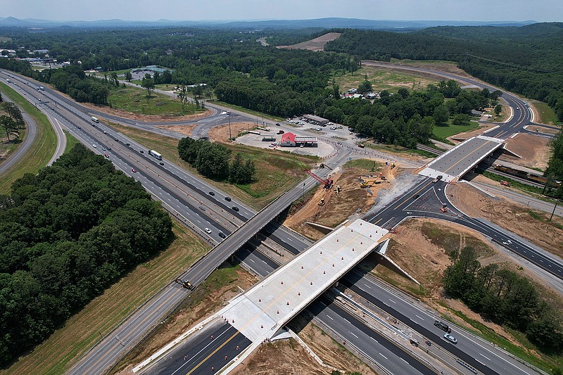 Vehicular traffic moves under the new Arkansas 89 overpass constructed across Interstate 40 in Mayflower on Friday.
(Arkansas Democrat-Gazette/Colin Murphey)
