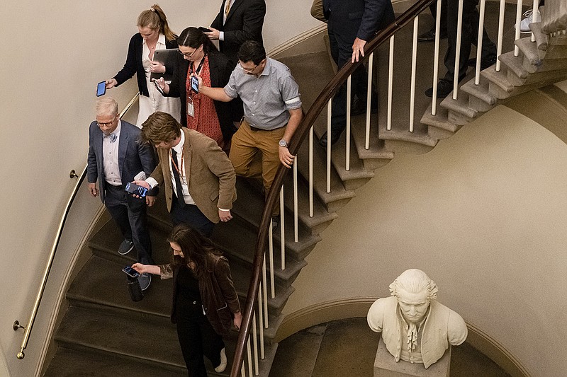 Reporters trail Rep. Patrick McHenry, R-N.C., one of the lead negotiators for House Speaker Kevin McCarthy, at the Capitol on Friday. “The deal’s within reach, it just has to be agreed to,” McHenry said.
(The New York Times/Haiyun Jiang)