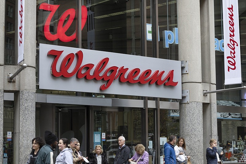 Pedestrians pass a Walgreens store in Boston in October 2022.
(AP)