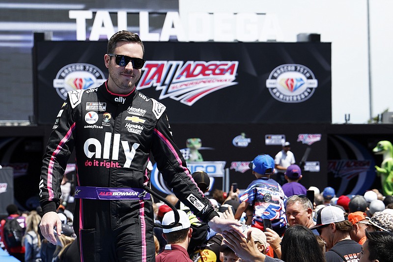 In this April 23 file photo, Alex Bowman greets fans before a NASCAR Cup Series race at Talladega Superspeedway in Talladega, Ala. (The Associated Press)