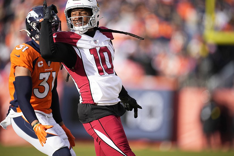 In this Dec. 18, 2022, file photo, Cardinals wide receiver DeAndre Hopkins celebrates during a game against the Broncos in Denver. (Associated Press)