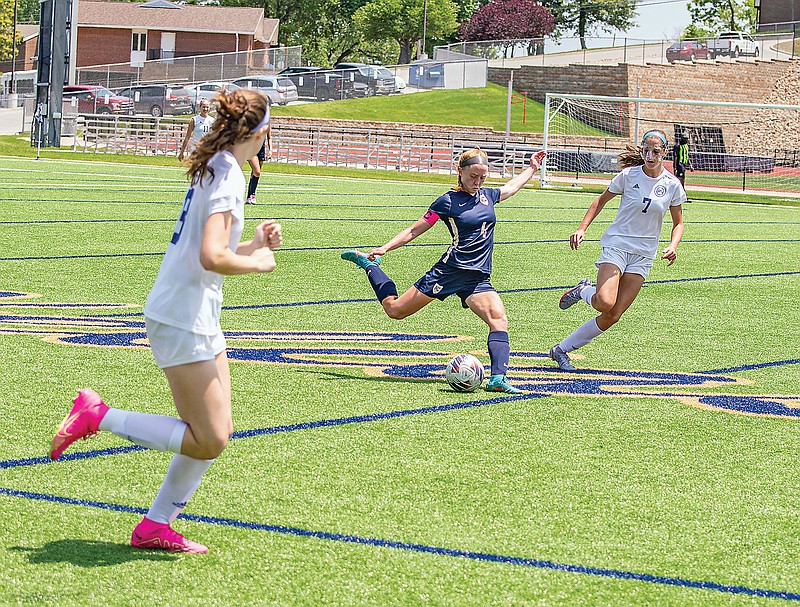 Dani Buker of Helias prepares to kick the ball downfield during Saturday afternoon’s Class 2 quarterfinal match against St. Pius X: Kansas City at the Crusader Athletic Complex. (Ken Barnes/News Tribune)