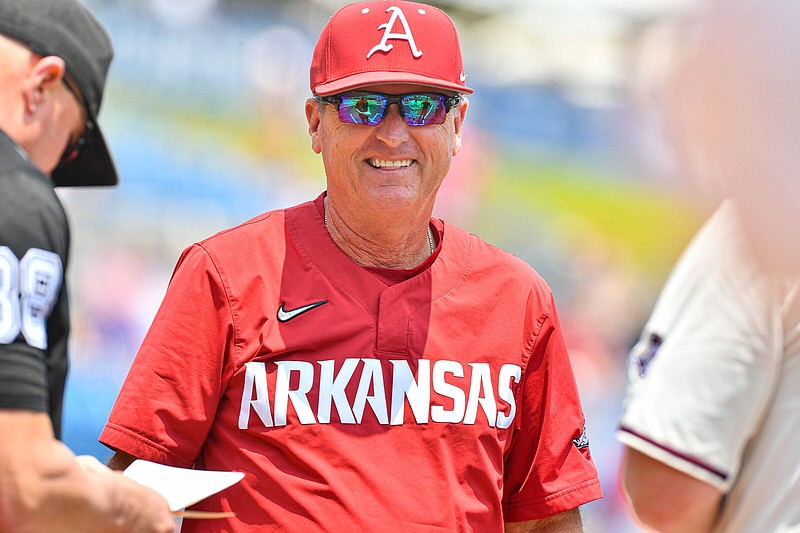 Arkansas head coach Dave Van Horn exchanges lineup cards, Saturday, May 27, 2023, before the first inning of the Razorbacks’ game against the Texas A&M Aggies in the semifinals of the 2023 SEC Baseball Tournament at the Hoover Metropolitan Complex in Hoover, Ala. Visit nwaonline.com/photo for today's photo gallery..(NWA Democrat-Gazette/Hank Layton)