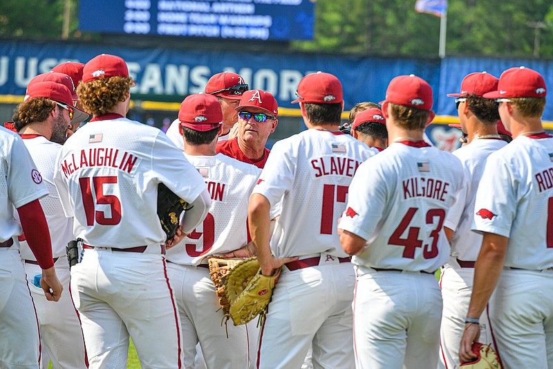 Arkansas head coach Dave Van Horn (center) talks to his team during warmups, Thursday, May 25, 2023, before the Razorbacks’ game against the LSU Tigers at the 2023 SEC Baseball Tournament at the Hoover Metropolitan Complex in Hoover, Ala. Visit nwaonline.com/photo for today's photo gallery..(NWA Democrat-Gazette/Hank Layton)