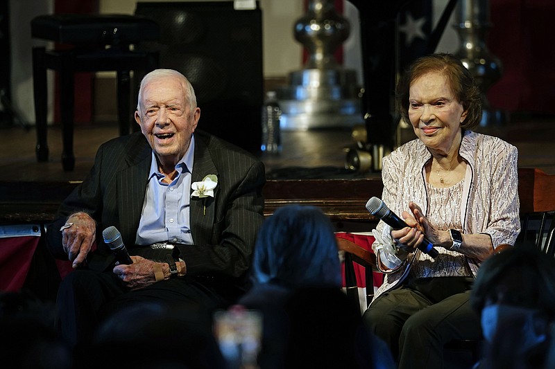 FILE - Former President Jimmy Carter and his wife former first lady Rosalynn Carter sit together during a reception to celebrate their 75th wedding anniversary on July 10, 2021, in Plains, Ga. The Carter family shared news that Rosalynn Carter has dementia, The Carter Center announced Tuesday, May 30, 2023. (AP Photo/John Bazemore, Pool, File)