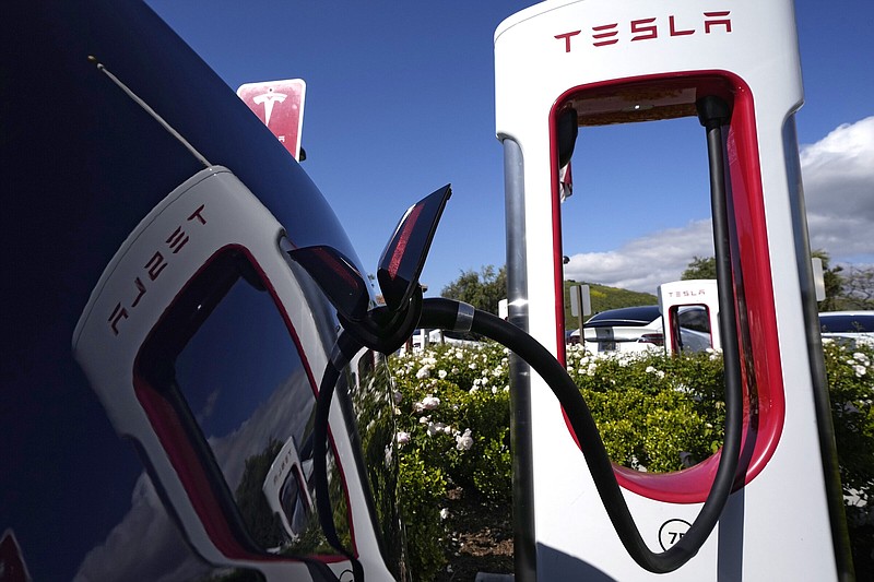 A Tesla auto gets a charge at a station in Westlake, Calif., last month. Tesla Superchargers currently hold the No. 1 rank for reliability and ease of use in J.D. Power’s consumer survey.
(AP)