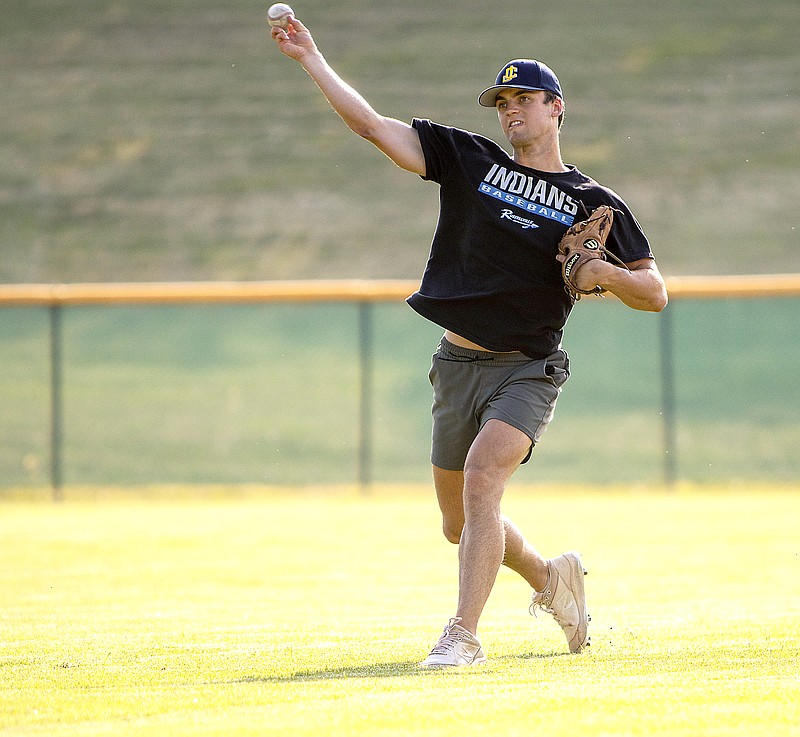 Russellville graduate Charlie Miller plays catch before Renegades’ practice Tuesday at Vivion Field. (Josh Cobb/News Tribune)