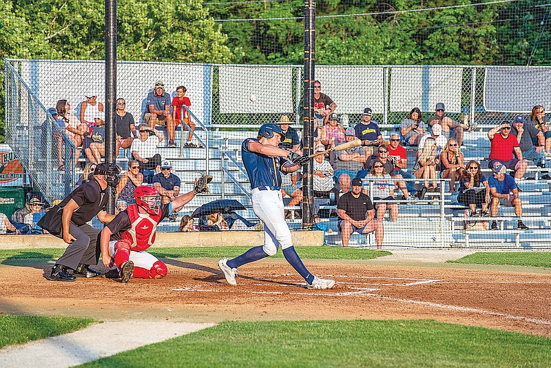 Charlie Rogan fouls off a pitch for the Renegades during their season opener Wednesday night against the Sedalia Bombers at Vivion Field. (Ken Barnes/News Tribune)