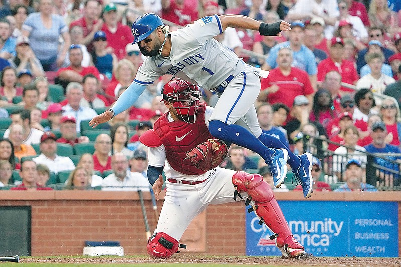 MJ Melendez of the Royals is out at home as he tries unsuccessfully to avoid the tag from Cardinals catcher Willson Contreras during the fourth inning of Tuesday night’s game at Busch Stadium in St. Louis. (Associated Press)