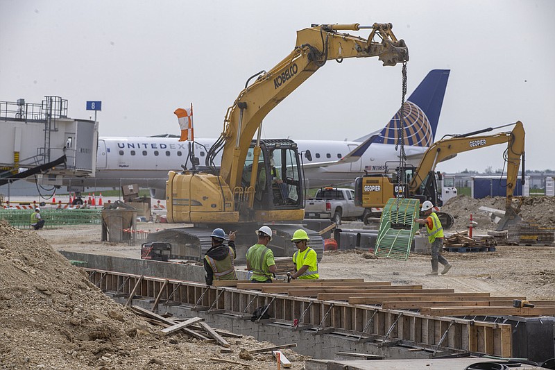 Construction crews work on a terminal expansion project at the Eastern Iowa Airport in Cedar Rapids, Iowa, in this May 25, 2023 file photo. (Nick Rohlman/The Gazette via AP)