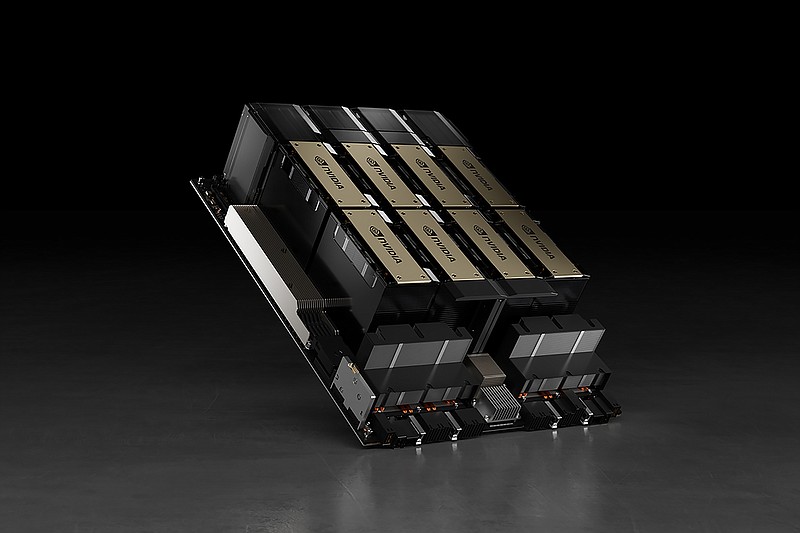 This photo provided by the chipmaker Nvidia shows the company’s HGX H100 module, which can use as many as eight AI chips to train artificial intelligence systems and perform other tasks. Such AI chips are tiny slivers of silicon designed to simplify and speed up the development of artificial intelligence systems such as ChatGPT, making them one of the hottest items in technology. (Nvidia via AP)