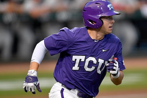 TCU third baseman Brayden Taylor heads to first Friday, June 2, 2023, after hitting a three-run home run during the first inning against Arizona in the first round of the NCAA Fayetteville Regional at Baum-Walker Stadium in Fayetteville.