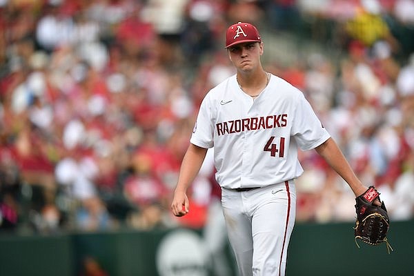 Arkansas reliever Will McEntire leaves the field Friday, June 2, 2023, after stranding a runner at third base during the sixth inning of the Razorbacks’ 13-6 win over Santa Clara in the first round of the NCAA Fayetteville Regional at Baum-Walker Stadium in Fayetteville.