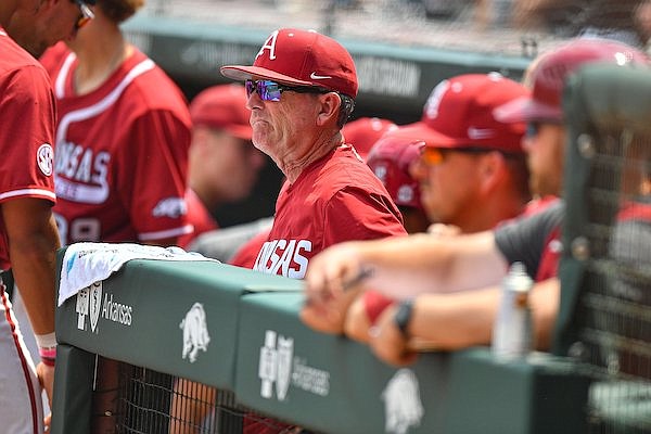 Arkansas head coach Dave Van Horn (center) reacts in the dugout, Sunday, June 4, 2023, during the first inning of the Razorbacks’ game against TCU in the second round of the NCAA Fayetteville Regional at Baum-Walker Stadium in Fayetteville. Visit nwaonline.com/photo for today's photo gallery....(NWA Democrat-Gazette/Hank Layton)