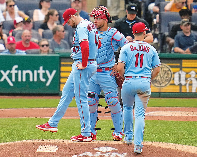Cardinals starting pitcher Jordan Montgomery kicks the mound as he waits for manager Oli Marmol after allowing three runs in the sixth inning of Saturday’s game against the Pirates in Pittsburgh. (Associated Press)