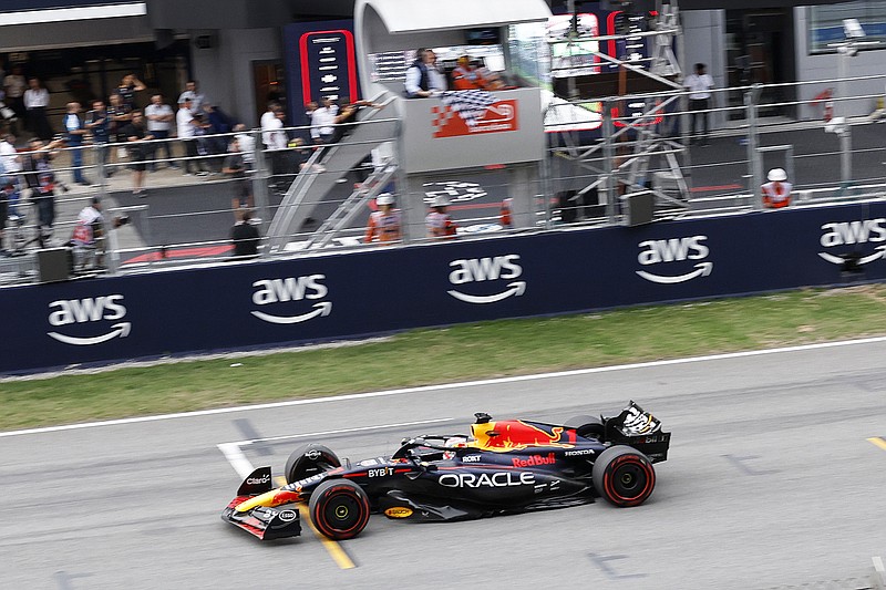 Max Verstappen crosses the finish line Sunday to win the Spanish Formula One Grand Prix at the Barcelona Catalunya racetrack in Montmelo, Spain. (Associated Press)