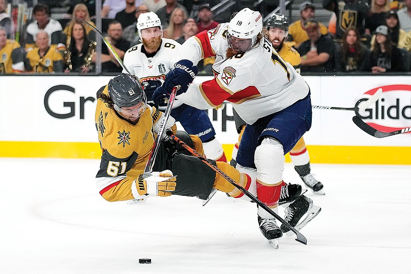 Panthers defenseman Marc Staal checks Golden Knights right wing Mark Stone during the second period of Saturday night’s Game 1 of the Stanley Cup Final in Las Vegas. (Associated Press)