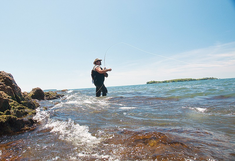 “Paddle” Don Cranfill fishes for smallmouth bass on Middle Bass Island in Lake Erie. (Contributed photo)