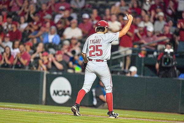 Arkansas starting pitcher Brady Tygart (25) celebrates on his way back to the dugout, Sunday, June 4, 2023, during the fourth inning against the Santa Clara Broncos in an elimination game of the NCAA Fayetteville Regional at Baum-Walker Stadium in Fayetteville.