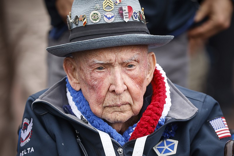 World War II veteran Jake Larson attends a ceremony to mark the 79th anniversary of the assault that led to the liberation of France and Western Europe from Nazi control, at the American Cemetery in Colleville-sur-Mer, Normandy, France, Tuesday, June 6, 2023. The American Cemetery is home to the graves of 9,386 United States soldiers. Most of them lost their lives in the D-Day landings and ensuing operations. (AP Photo/Thomas Padilla)