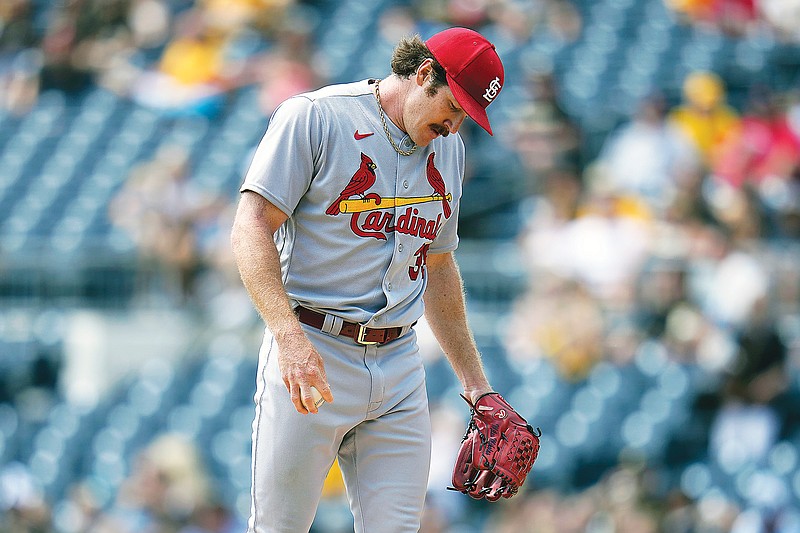 Cardinals starting pitcher Miles Mikolas collects himself after allowing two runs to score on a single by Ji Hwan Bae of the Pirates during the first inning of Sunday’s game in Pittsburgh. (Associated Press)