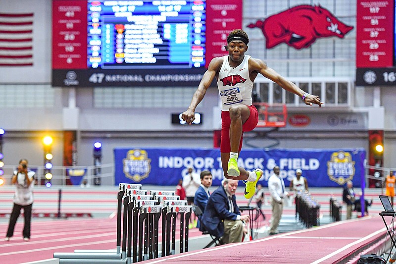 Arkansas jumper Jaydon Hibbert competes during his first-place performance in the triple jump finals, Saturday, Feb. 25, 2023, during the Razorbacks’ championship sweep at the Southeastern Conference 2023 Indoor Track and Field Championships at the Randal Tyson Track Center in Fayetteville. Visit nwaonline.com/photo for today's photo gallery..(NWA Democrat-Gazette/Hank Layton)