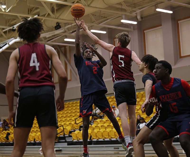 Marion's Lyndell Buckingham (2) puts up a shot during the Summerwood Sports Team Camp on the Hendrix College campus in Conway on Tuesday, June 6, 2023. (Arklansas Democrat-Gazette/Colin Murphey)