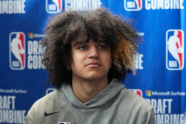 Anthony Black listens to a question from the media during the 2023 NBA basketball Draft Combine in Chicago, Wednesday, May 17, 2023. (AP Photo/Nam Y. Huh)