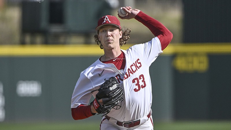 Arkansas pitcher Hagen Smith (33) throws against Louisiana Tech during an NCAA Baseball game on Friday, March 10, 2023, in Fayetteville, Ark. (AP Photo/Michael Woods)