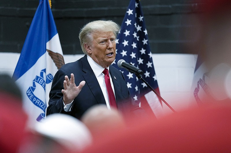 Former President Donald Trump visits with campaign volunteers at the Grimes Community Complex Park in Des Moines, Iowa, in this June 1, 2023 file photo. (AP/Charlie Neibergall)