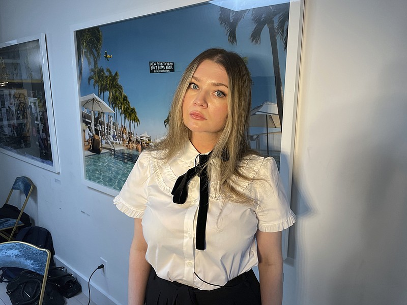 Anna Delvey, also known as Anna Sorokin, poses at her apartment in New York on May 26, 2023, to promote her podcast, “The Anna Delvey Show.” (AP Photo/John Carucci)