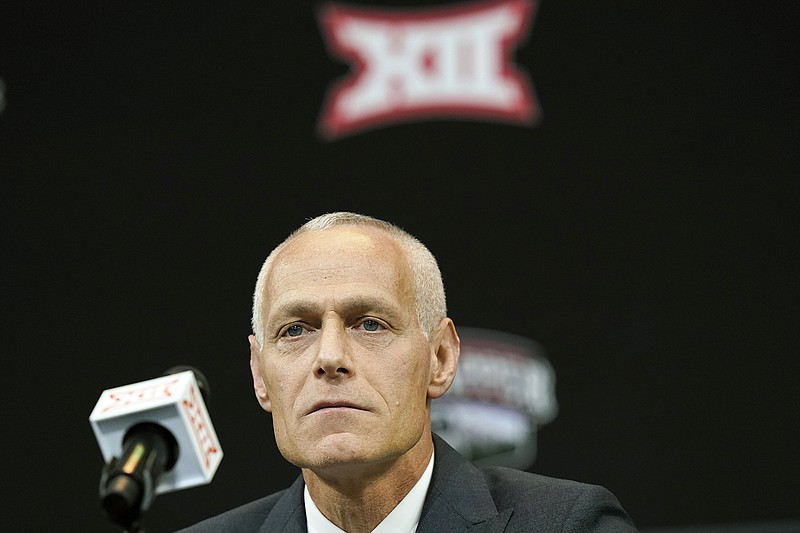In this July 13, 2022, file photo, then-incoming Big 12 commissioner Brett Yormark listens during a news conference in Arlington, Texas. (Associated Press)