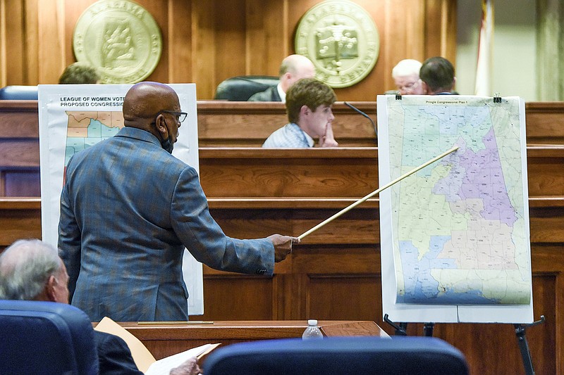 Alabama state Sen. Rodger Smitherman, D-Birmingham, compares U.S. representative district maps during the special session on redistricting at the Alabama Statehouse in Montgomery, Ala., in this Nov. 3, 2021 file photo. The U.S. Supreme Court ruled Thursday, June 8, 2023, that Alabama’s U.S. House districts violated the federal Voting Rights Act by diluting the political power of Black voters. (Mickey Welsh/The Montgomery Advertiser via AP, File)