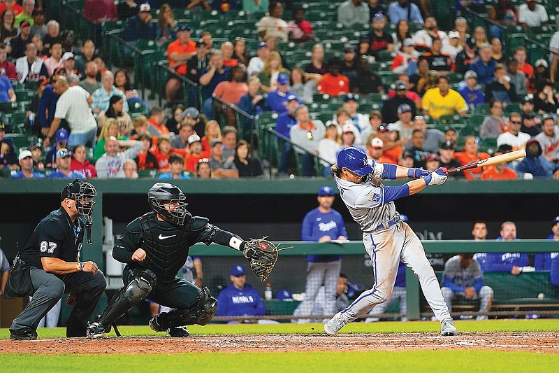 Bobby Witt Jr. of the Royals swings at a pitch during the eighth inning of Friday night’s game against the Orioles in Baltimore. (Associated Press)