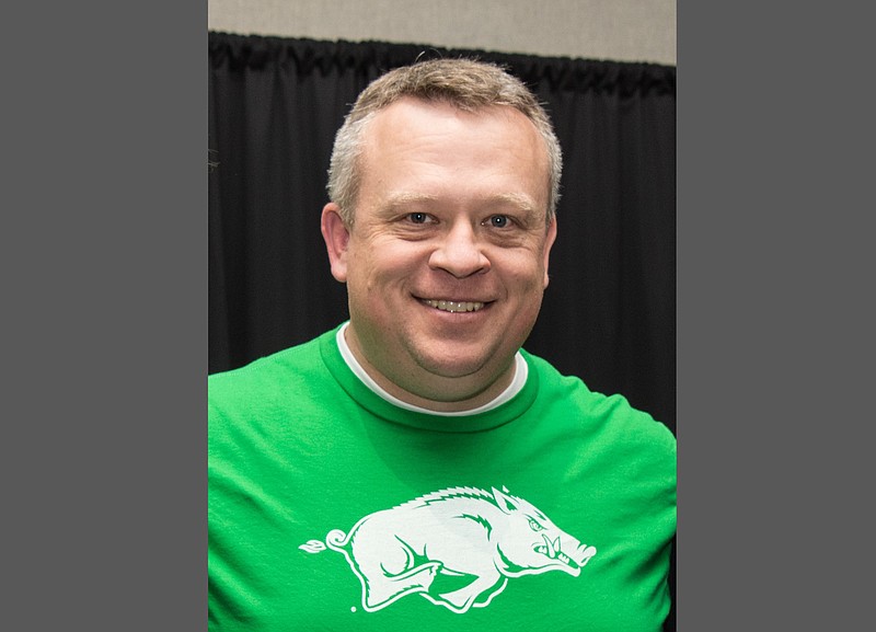John T. Vines wears a green Razorback shirt during a VIP reception for the First Ever 14th Annual World's Shortest St. Patrick's Day Parade in Hot Springs in this March 17, 2017 file photo. Arkansas House Speaker Matthew Shepherd announced Friday, June 16, 2023 that he has appointed Vines, the House's chief legal counsel and a former lawmaker, as the House parliamentarian and coordinator of legislative services, starting July 1, 2023, upon the retirement of House Parliamentarian Finos “Buddy” Johnson. (Arkansas Democrat-Gazette/Cary Jenkins)