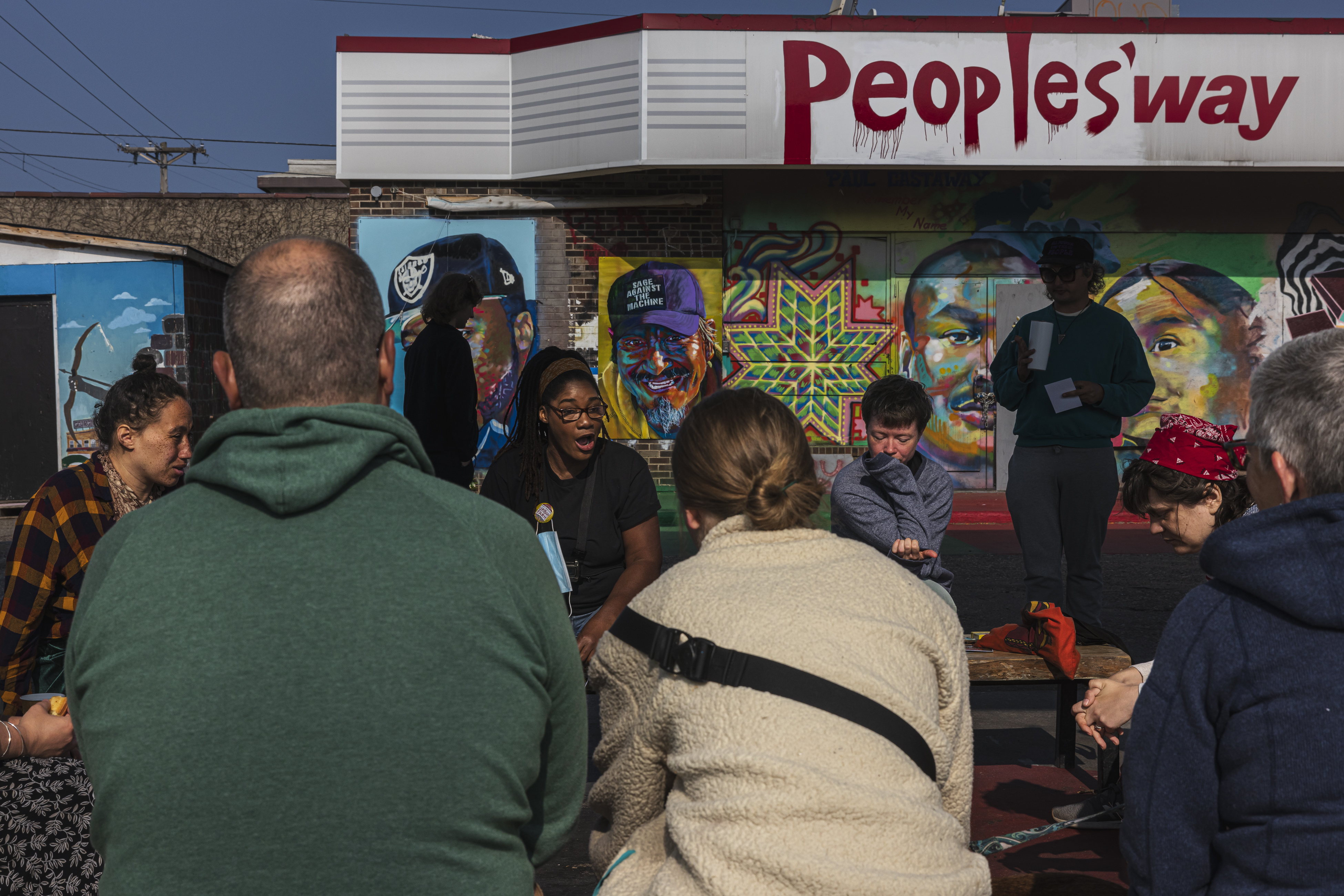 Marcia Howard, center, a local teacher and activist, speaks during a community morning meeting discussing the findings of a investigation into the city's police department, Friday, June 16, 2023 in Minneapolis. The Justice Department accused Minneapolis police Friday of engaging in a pattern of violating constitutional rights and discriminating against Black and Native American people following an investigation prompted by the killing of George Floyd.(Kerem Yücel /Minnesota Public Radio via AP)